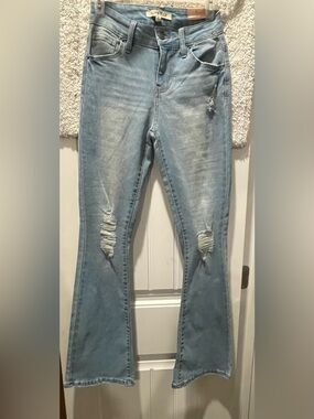 Light Blue Distressed Flare Jeans by Love Cult